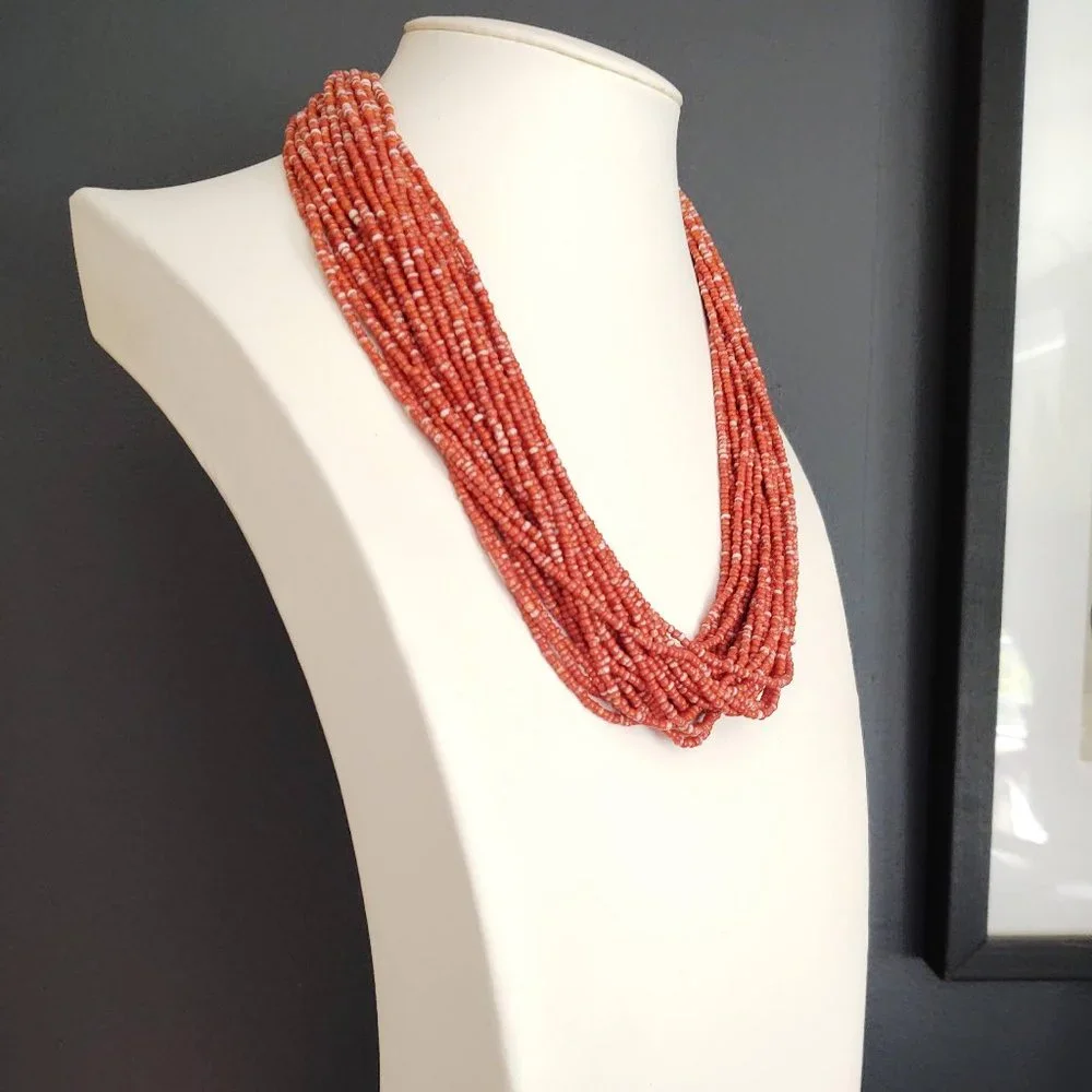 Orange and white multi strand seed bead necklace